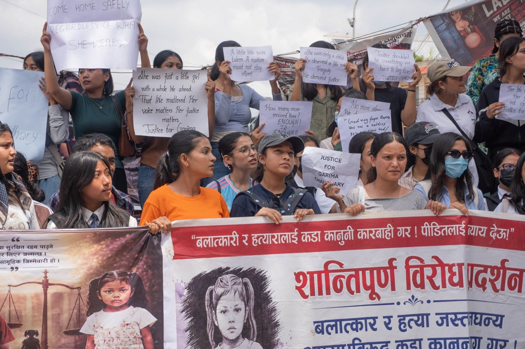 गरिमालाई न्याय माग्दै माइतीघरमा प्रदर्शन [तस्वीरहरू]